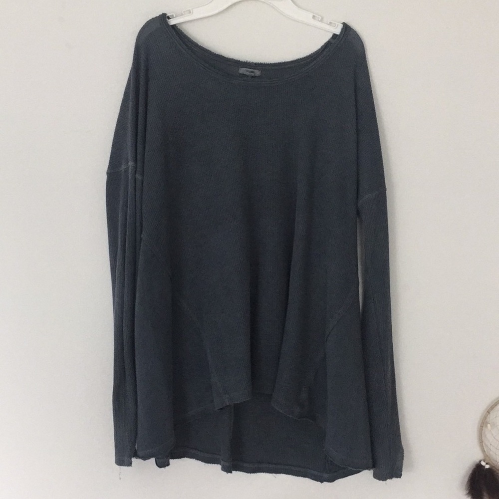 A dark vintage blue sweater